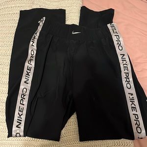 Black tear away Nike track pants